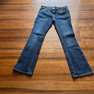 Old Navy dark blue boot cut jeans.